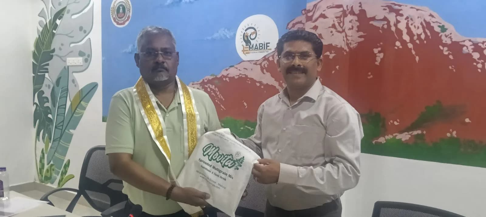 A MiracleTree bag being presented at a NABARD MABIF event