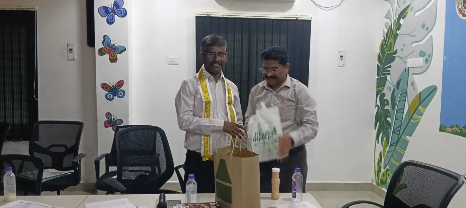A MiracleTree bag being presented to a visitor